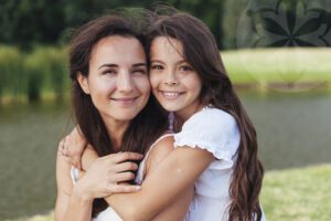 woman hugging daughter