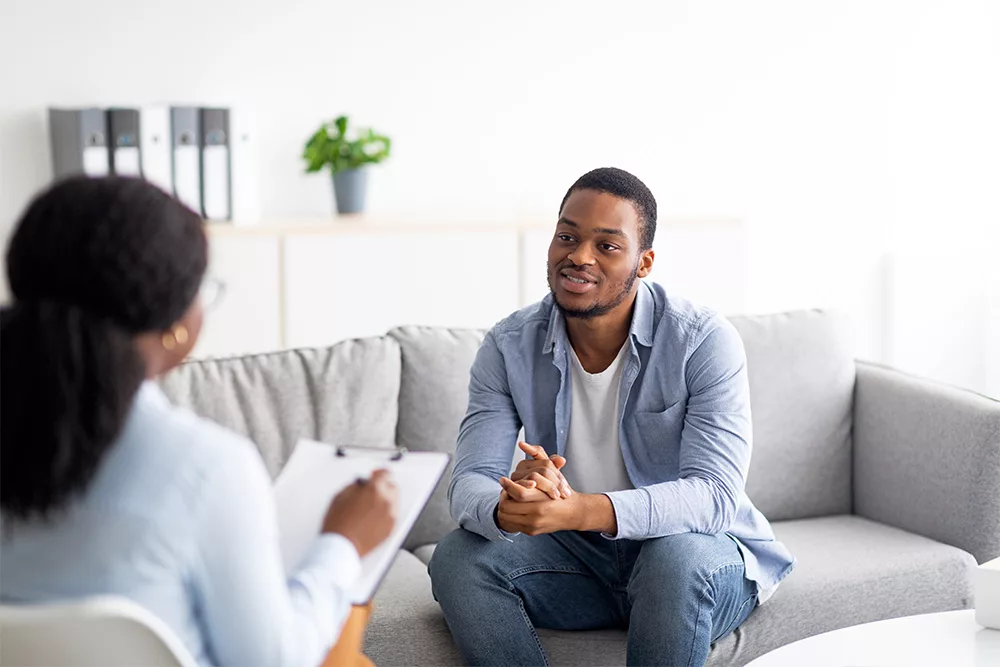 person talking to counselor