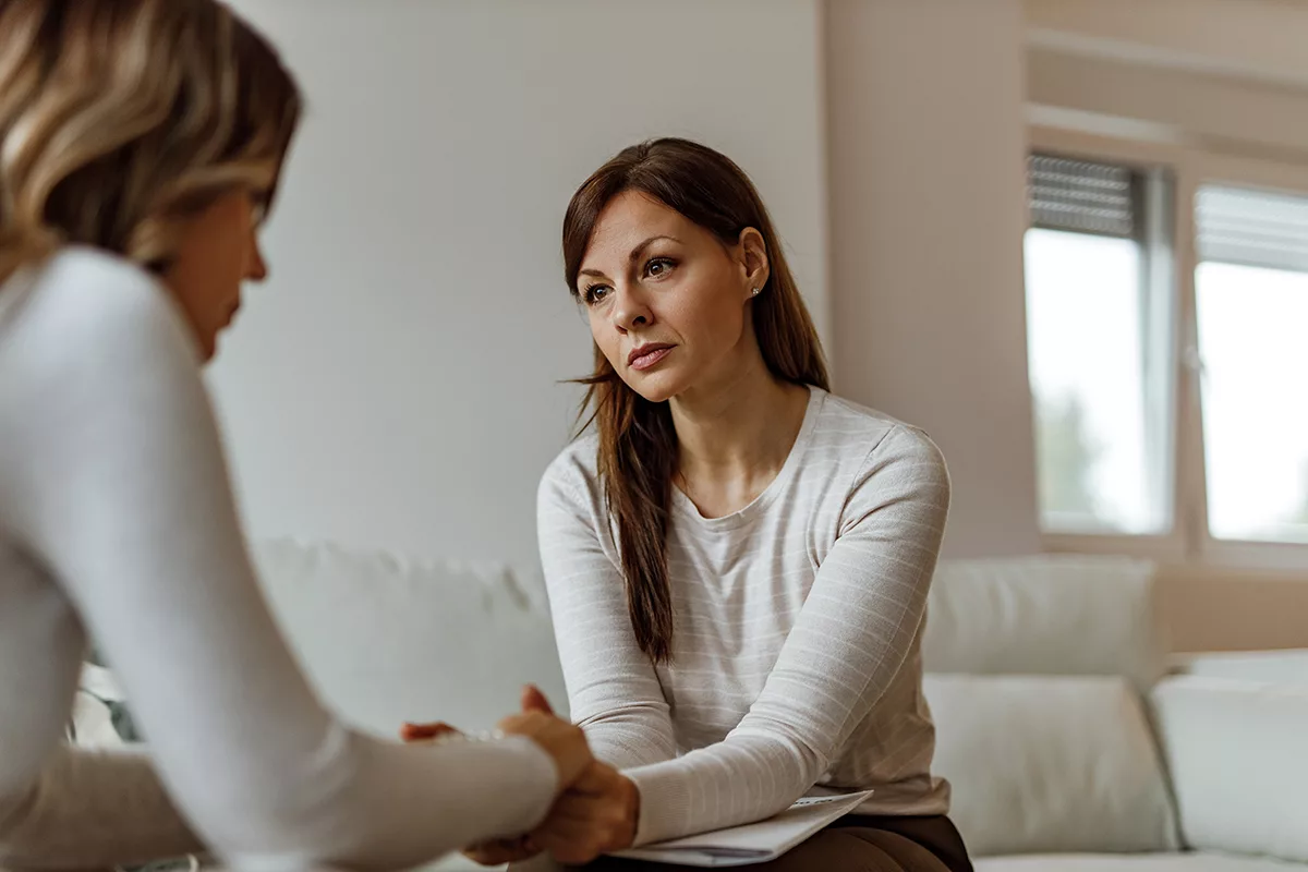 woman talking with therapist